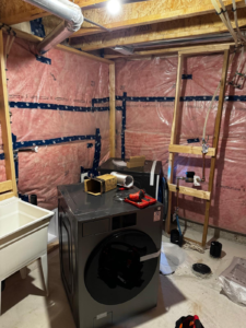 A washing machine and a drier prepared for installation