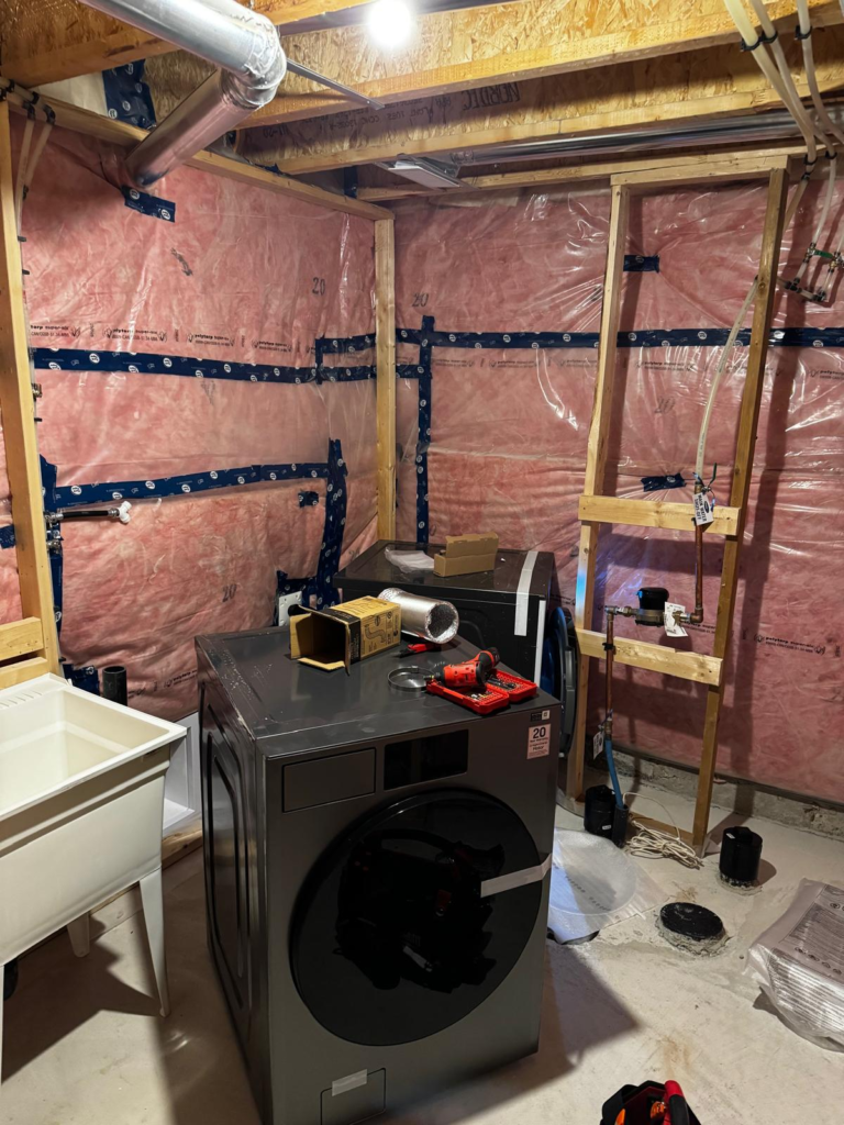 A washing machine and a drier prepared for installation