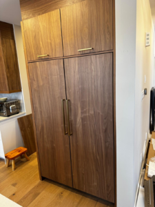 An integrated fridge installed in a cabinet